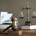 Gavel, scale of justice and a book